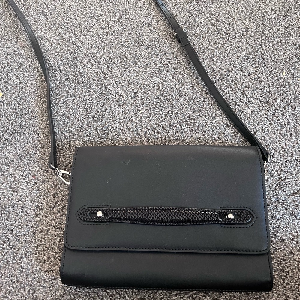 Elegant BCBG Max Azria Black Crossbody Bag retails for 110
